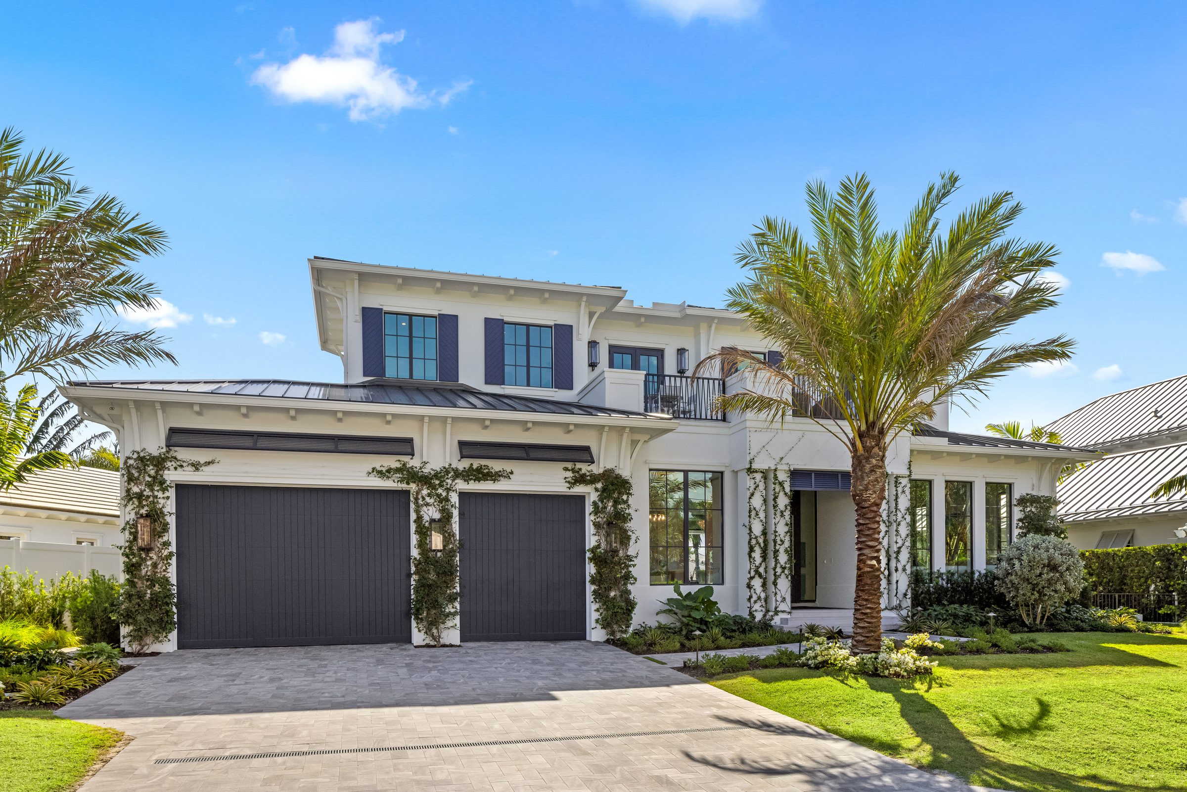 Front elevation of the custom home in Delray Beach — built by Varga Homes
