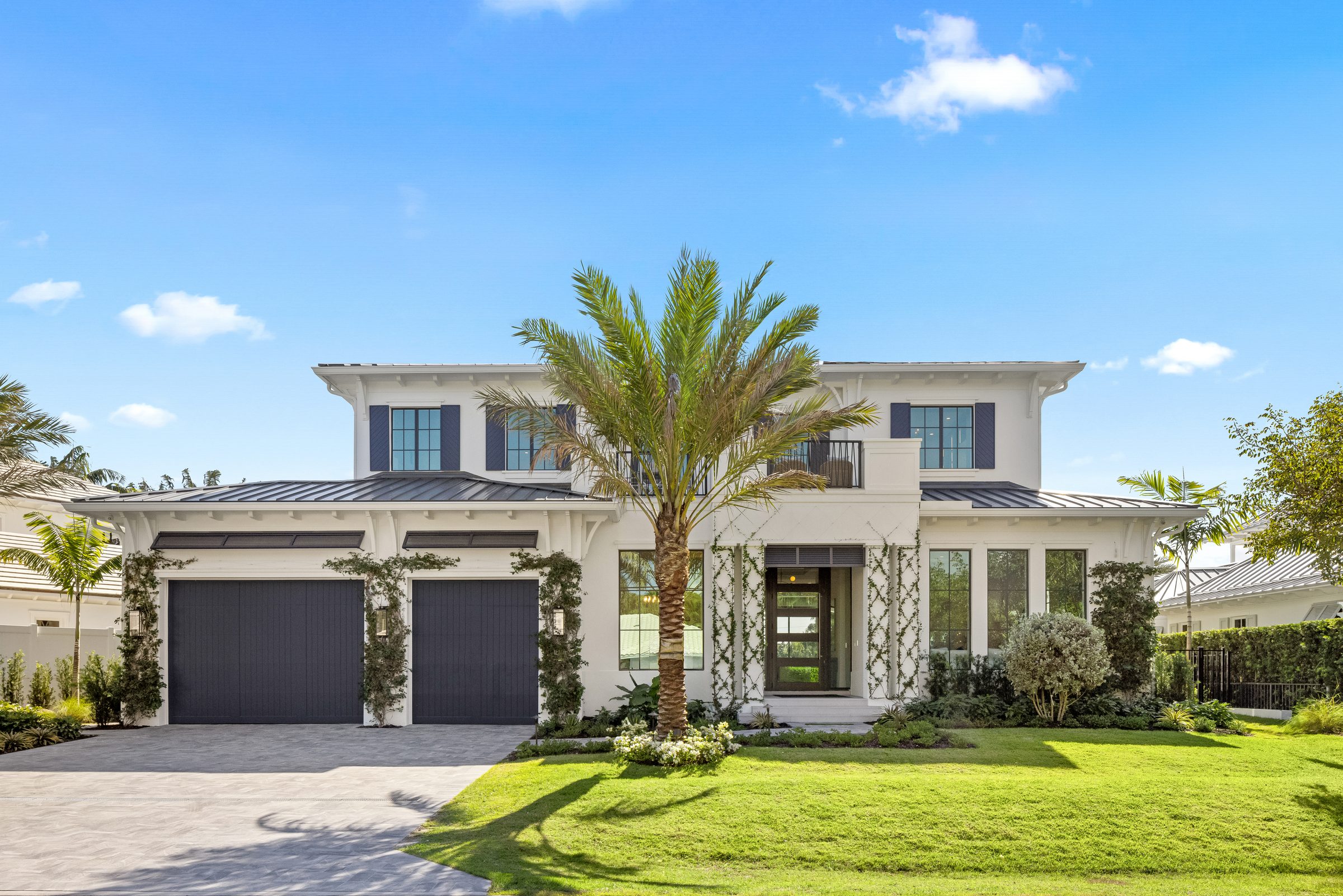 Front elevation of the custom home in Delray Beach — built by Varga Homes