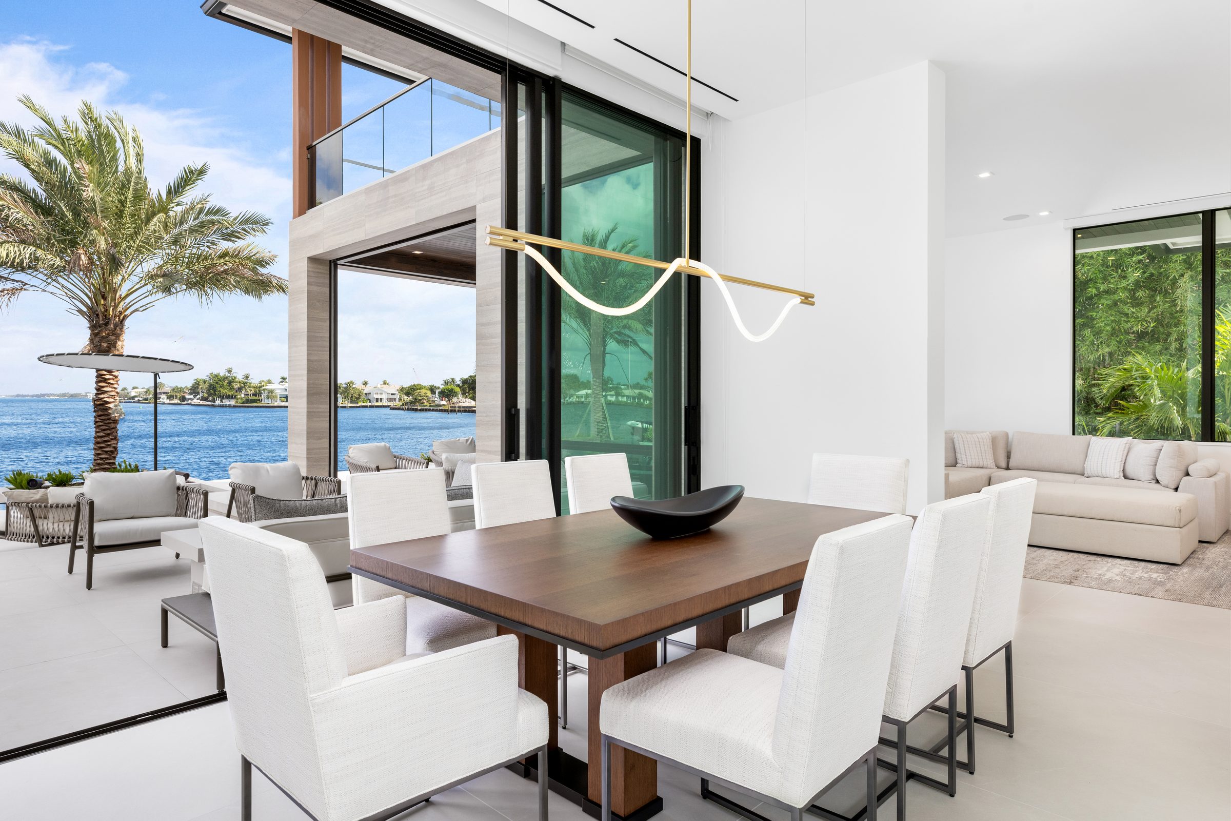 Dining room with water views in Ocean Ridge — built by Varga Homes
