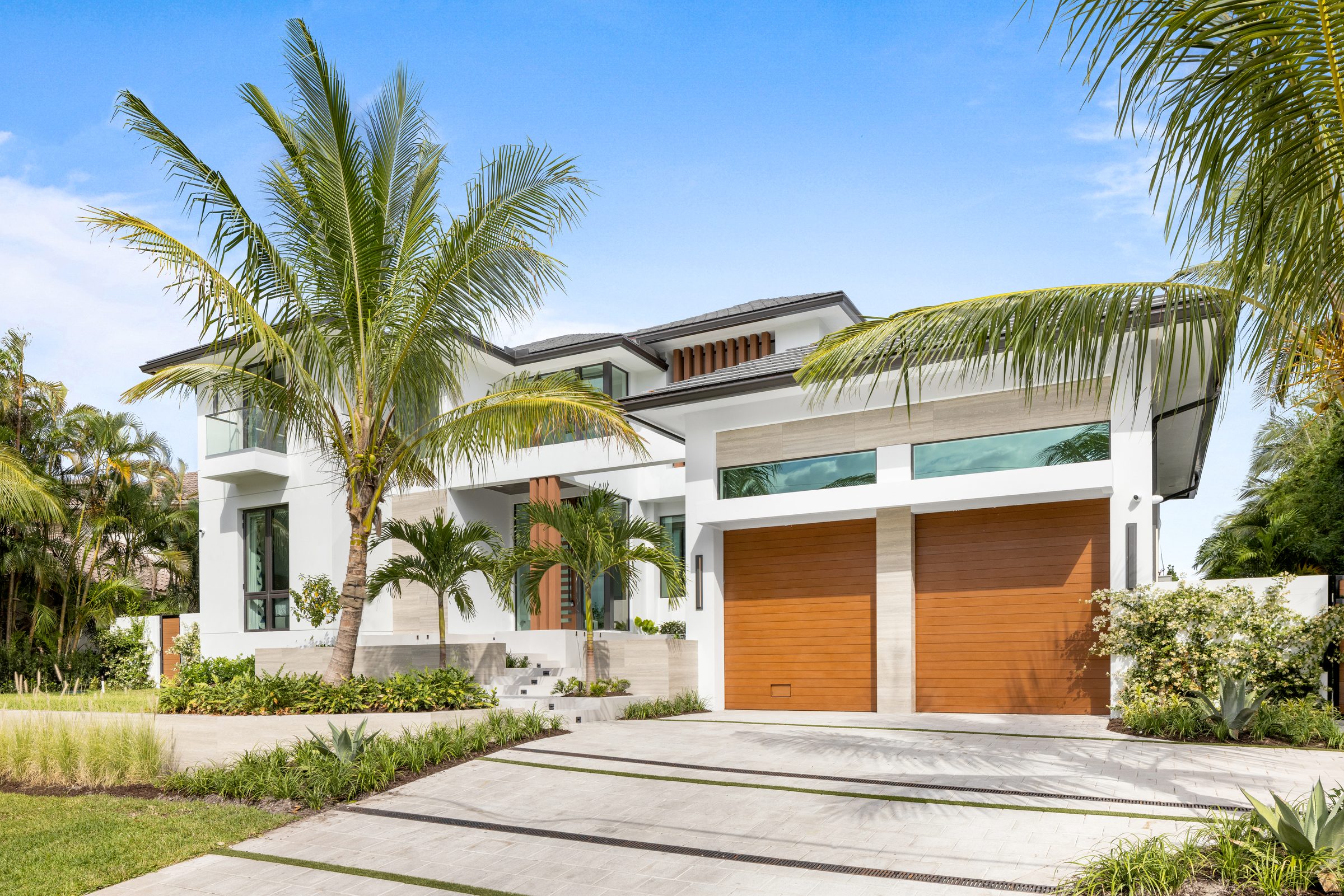 Front elevation of the custom home in Ocean Ridge — built by Varga Homes