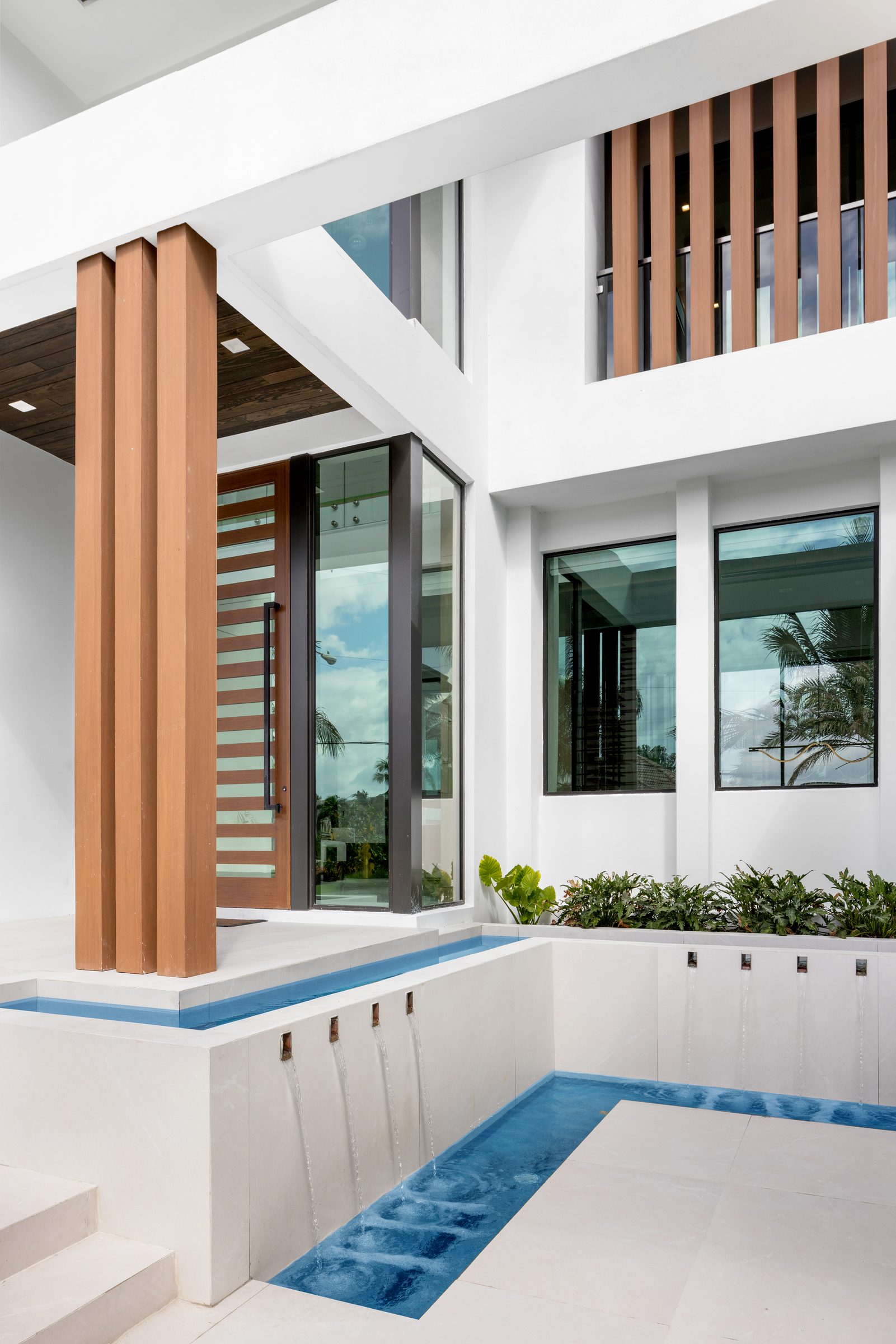 Front elevation of the custom home in Ocean Ridge — built by Varga Homes