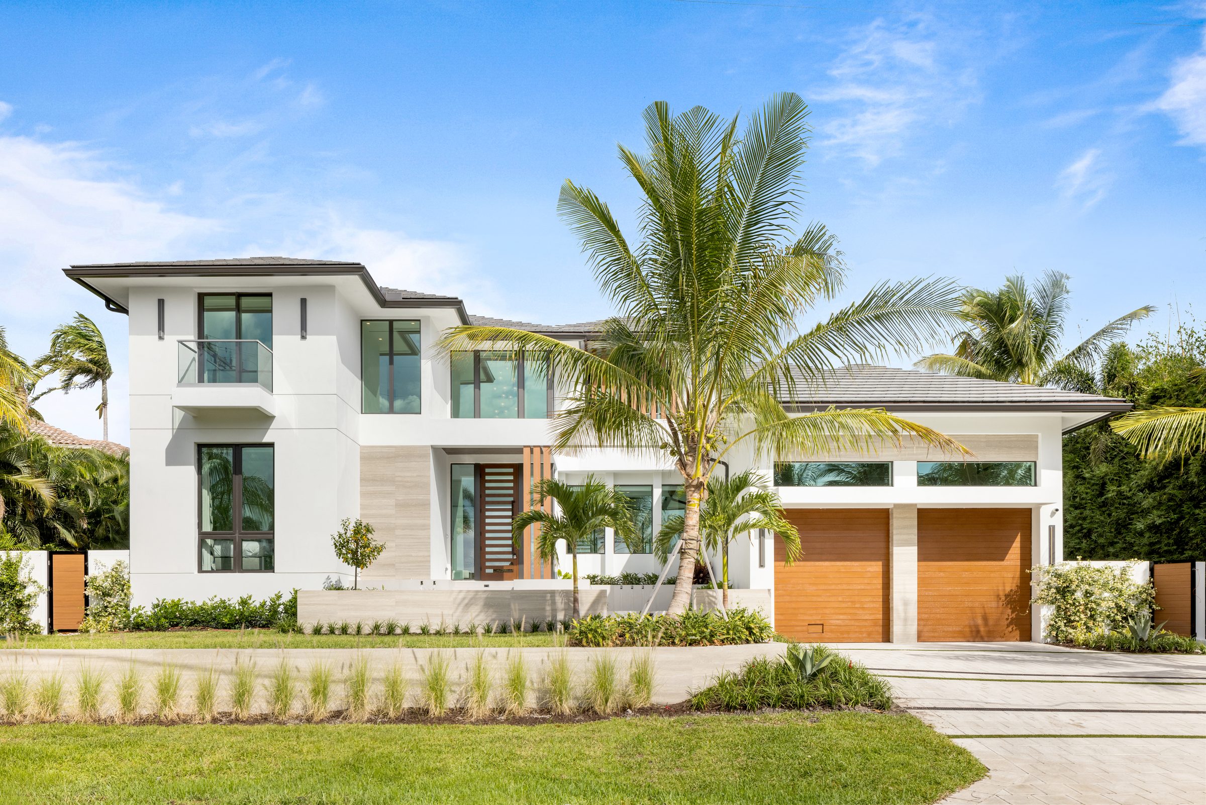 Front elevation of the custom home in Ocean Ridge — built by Varga Homes