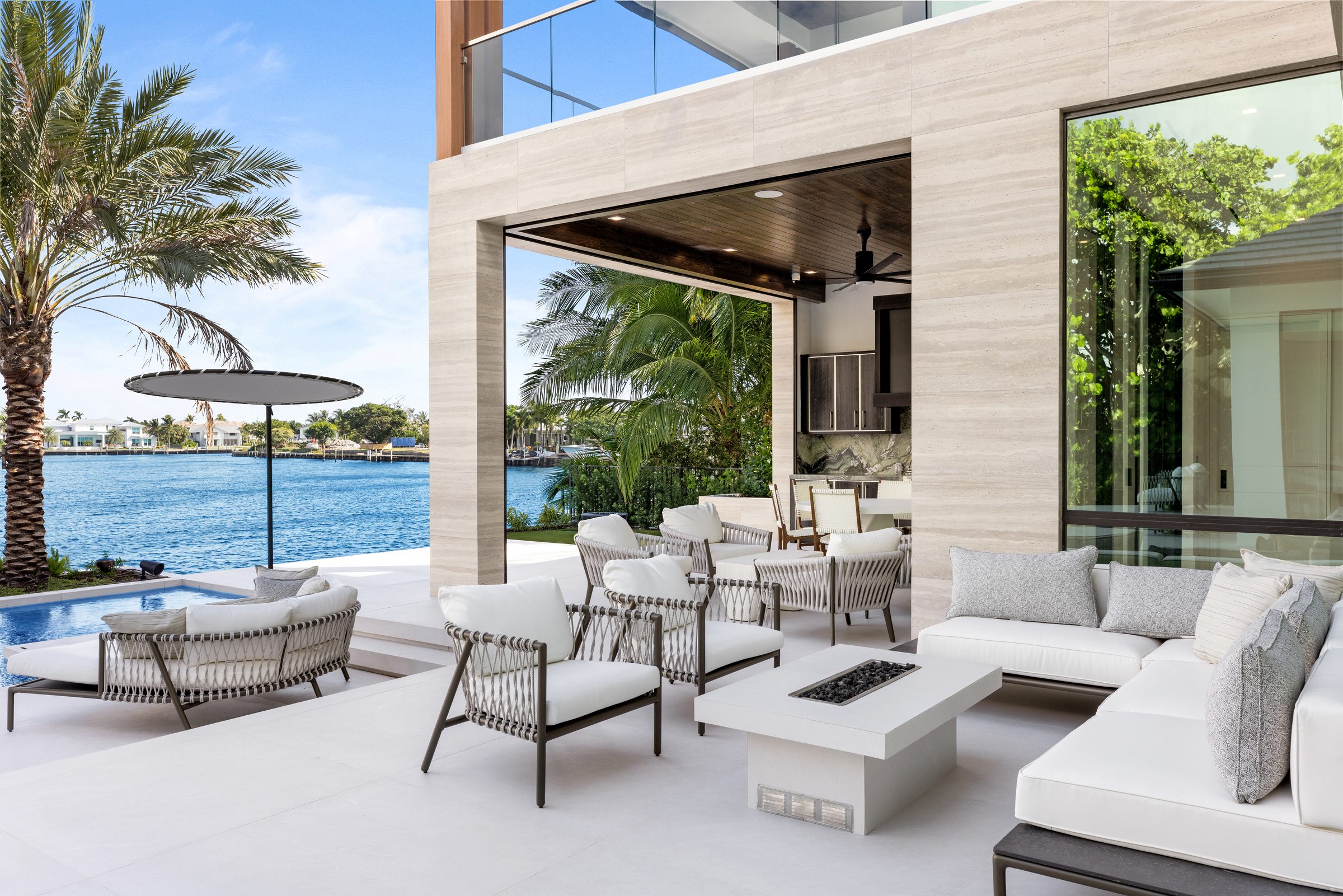 Covered loggia overlooking the water in Ocean Ridge — built by Varga Homes
