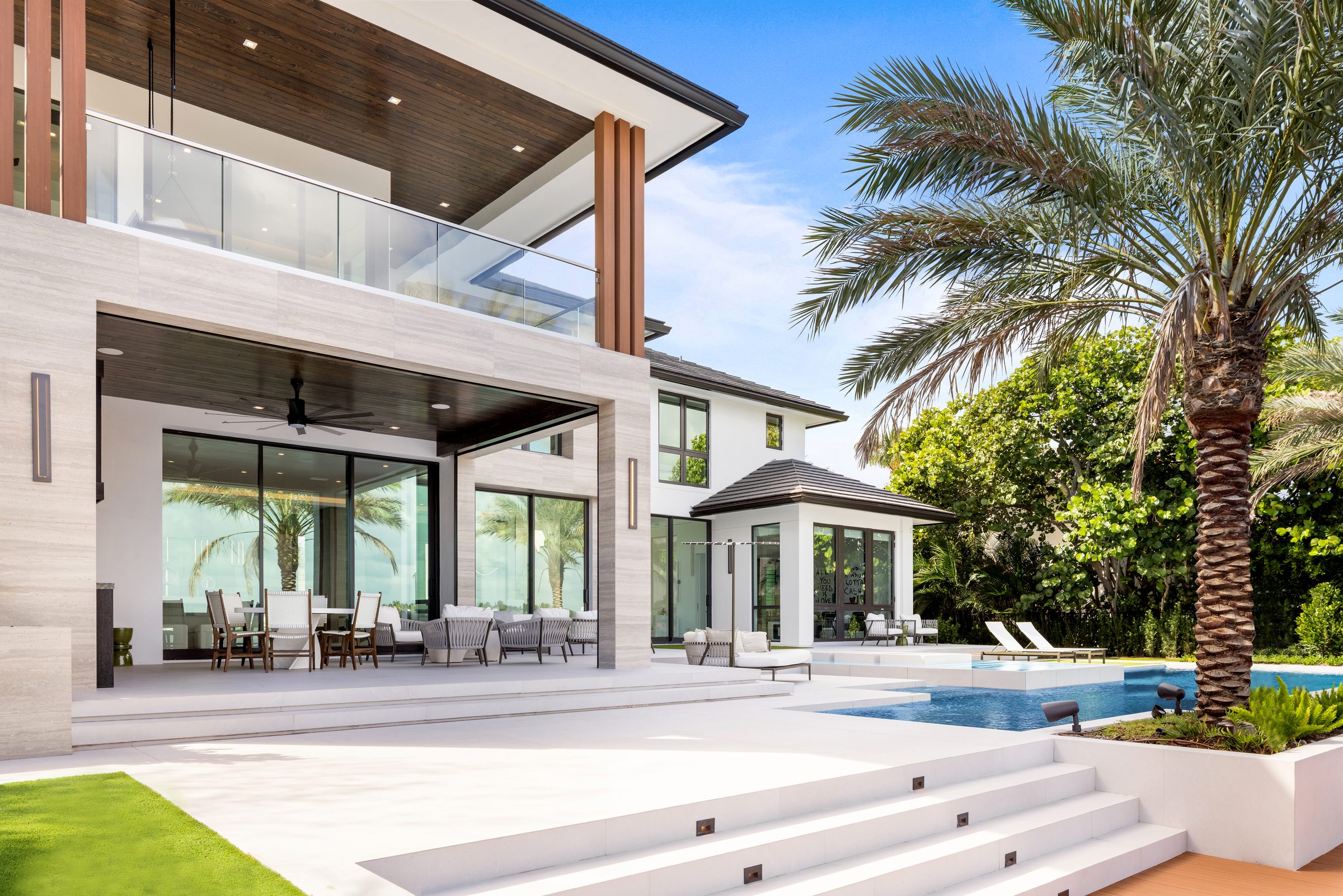 Infinity-edge pool overlooking the Intracoastal in Ocean Ridge — built by Varga Homes