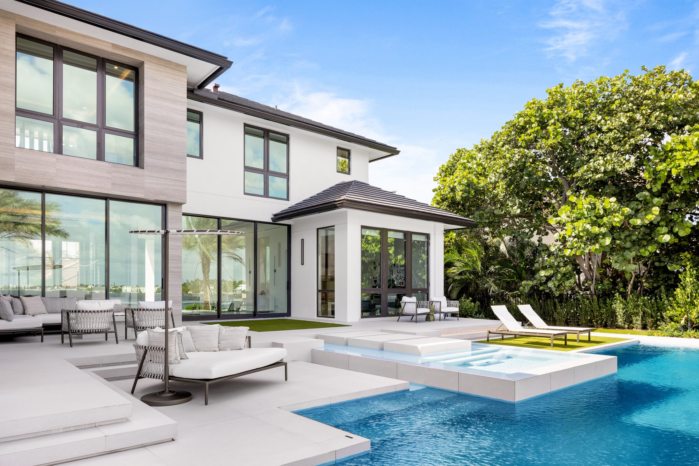 Infinity-edge pool overlooking the Intracoastal in Ocean Ridge — built by Varga Homes