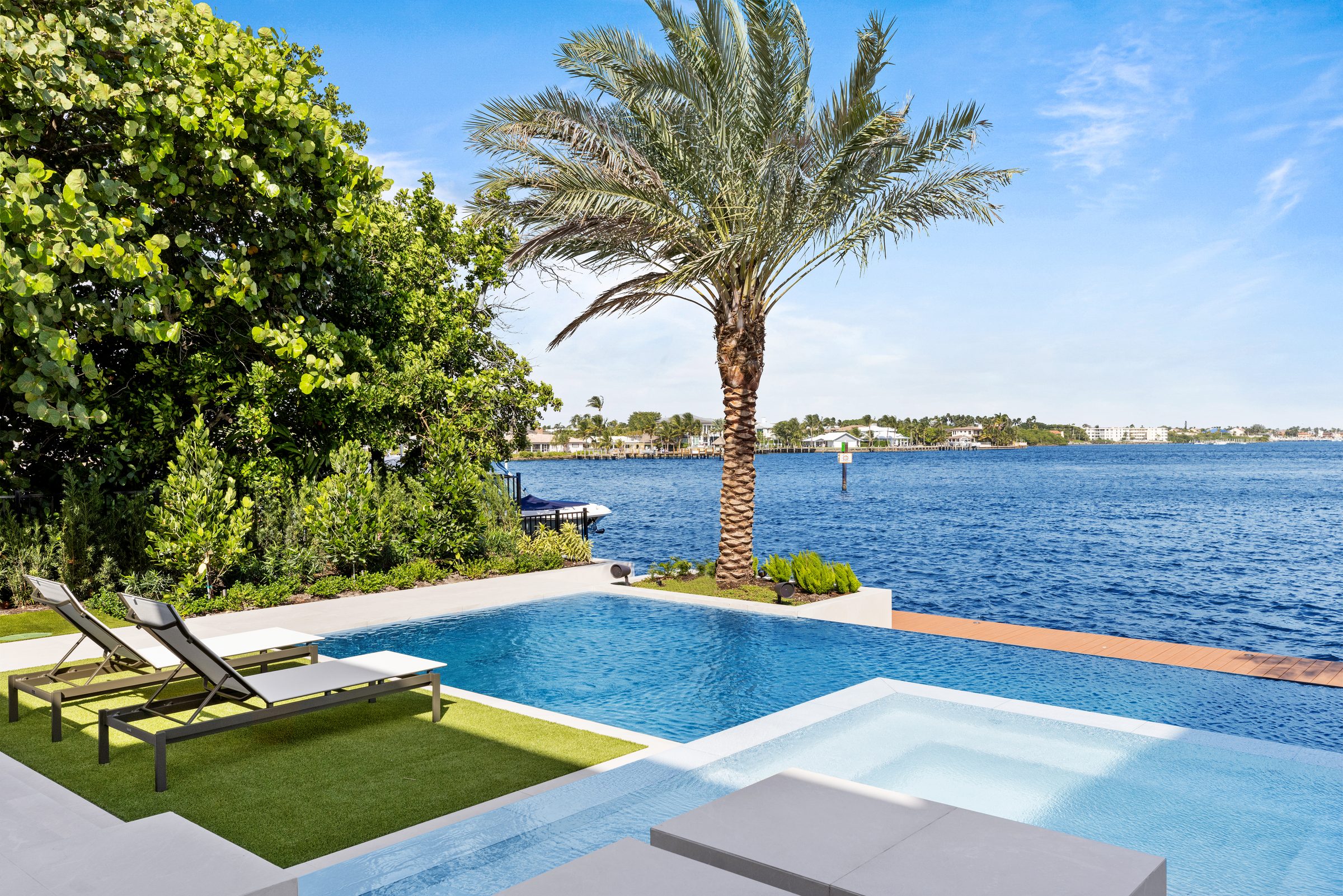 Infinity-edge pool overlooking the Intracoastal in Ocean Ridge — built by Varga Homes