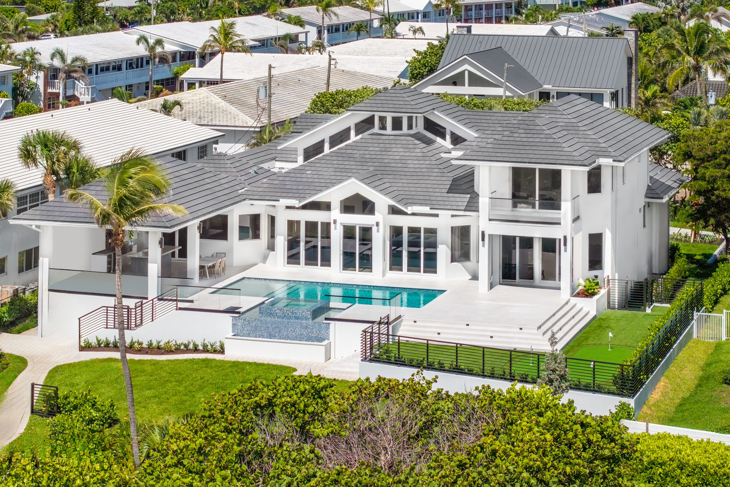 Aerial view of the oceanfront custom home in Ocean Ridge — built by Varga Homes
