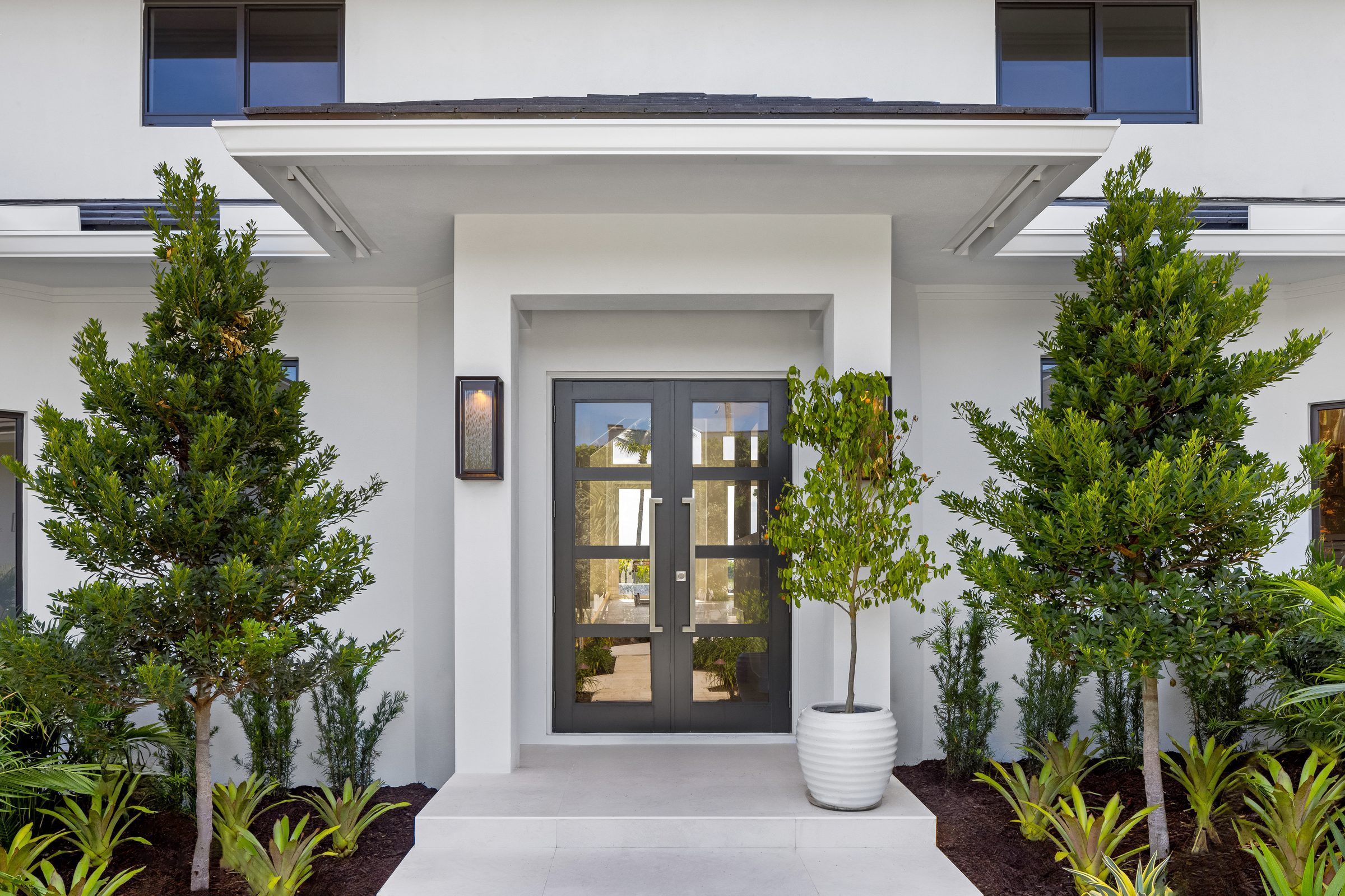 Front elevation of the custom home in Ocean Ridge — built by Varga Homes