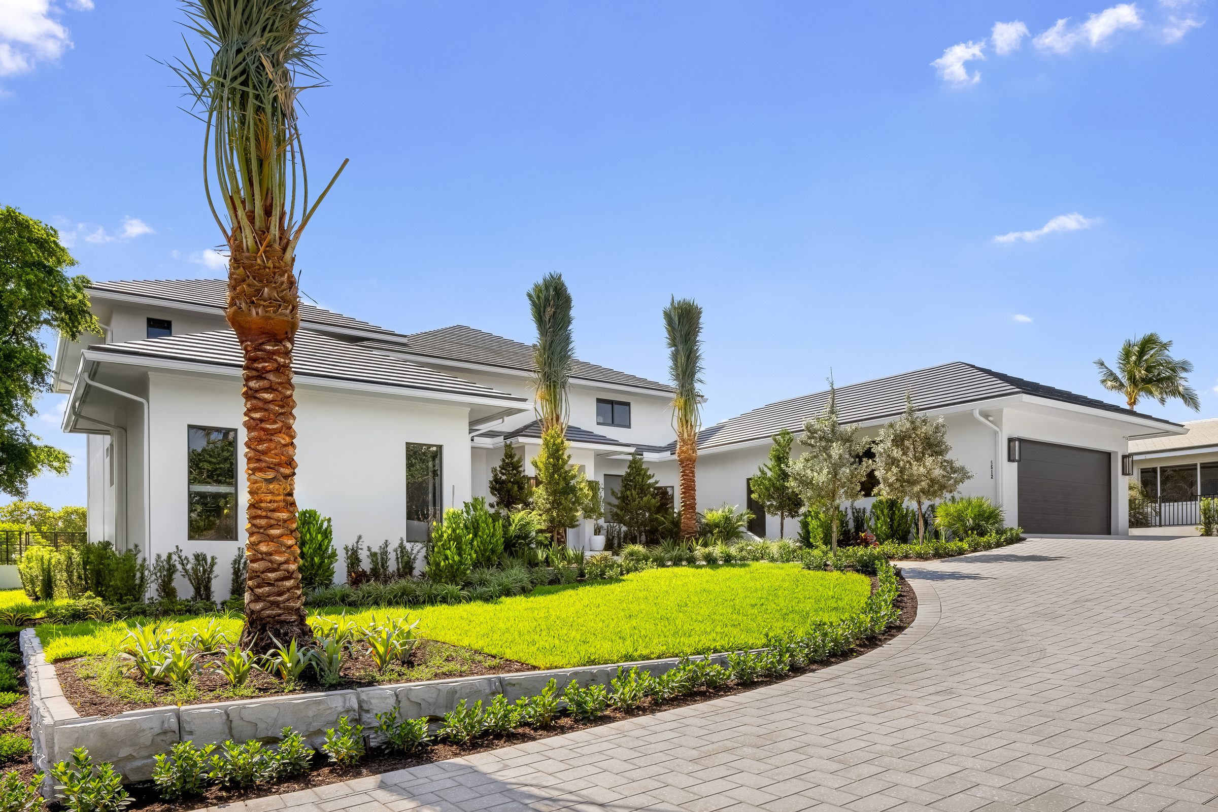 Front elevation of the custom home in Ocean Ridge — built by Varga Homes