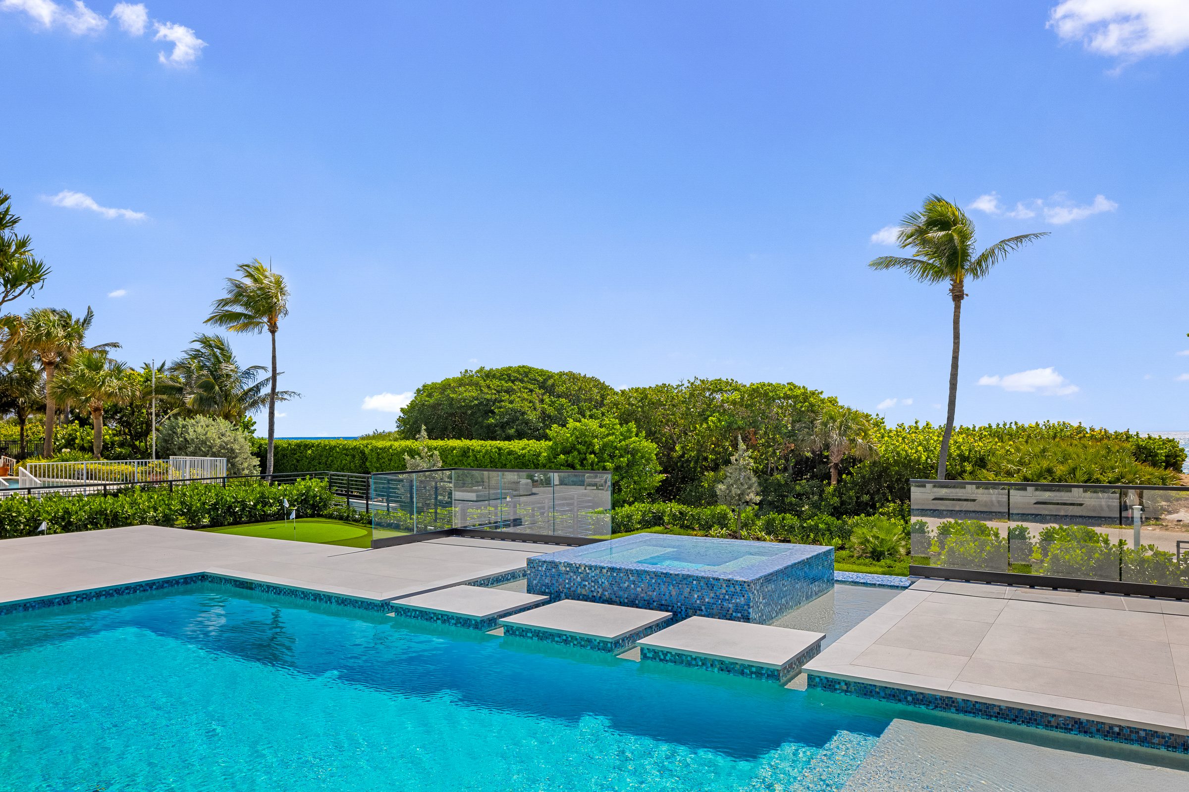 Pool and sun deck in Ocean Ridge — built by Varga Homes
