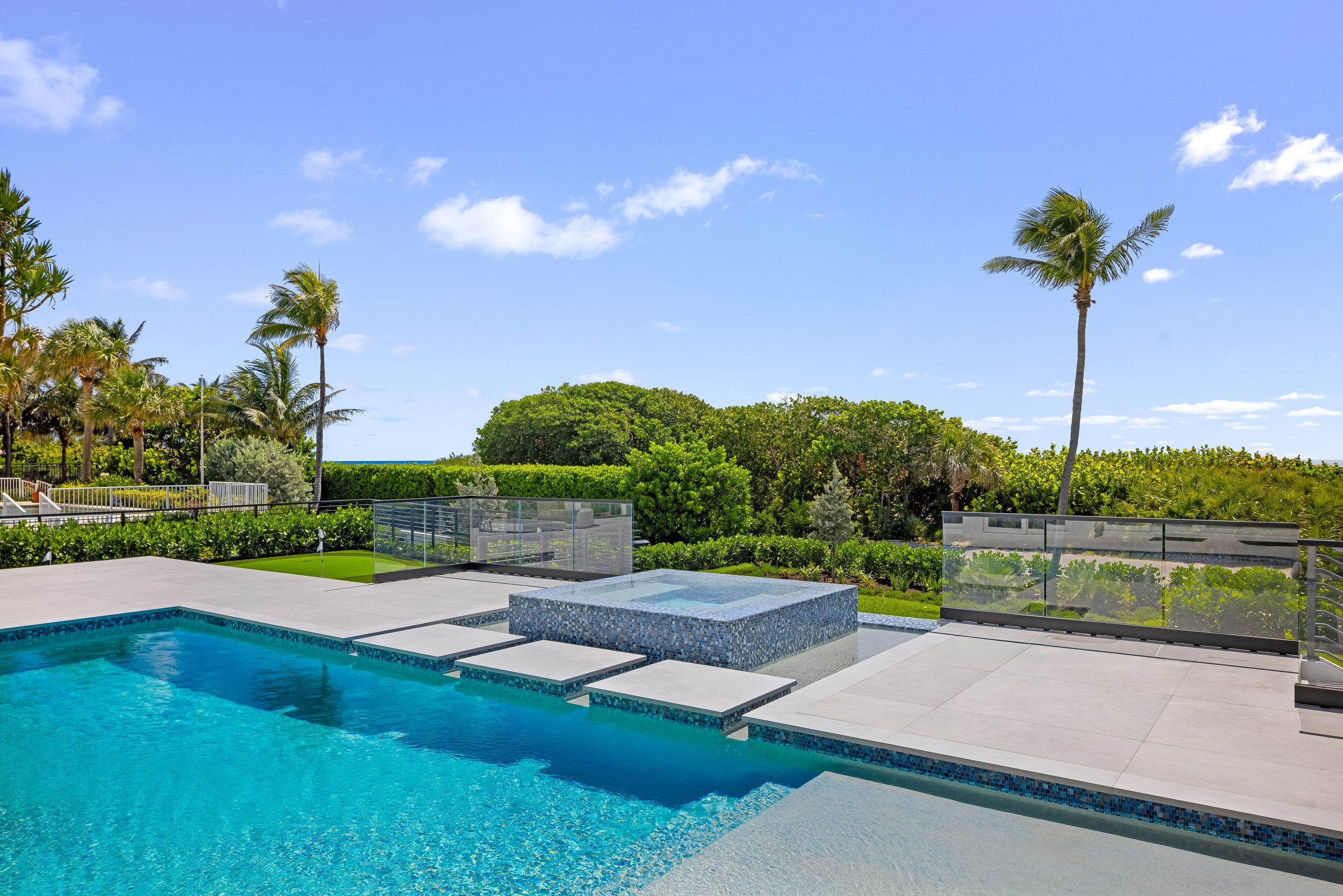 Pool and sun deck in Ocean Ridge — built by Varga Homes