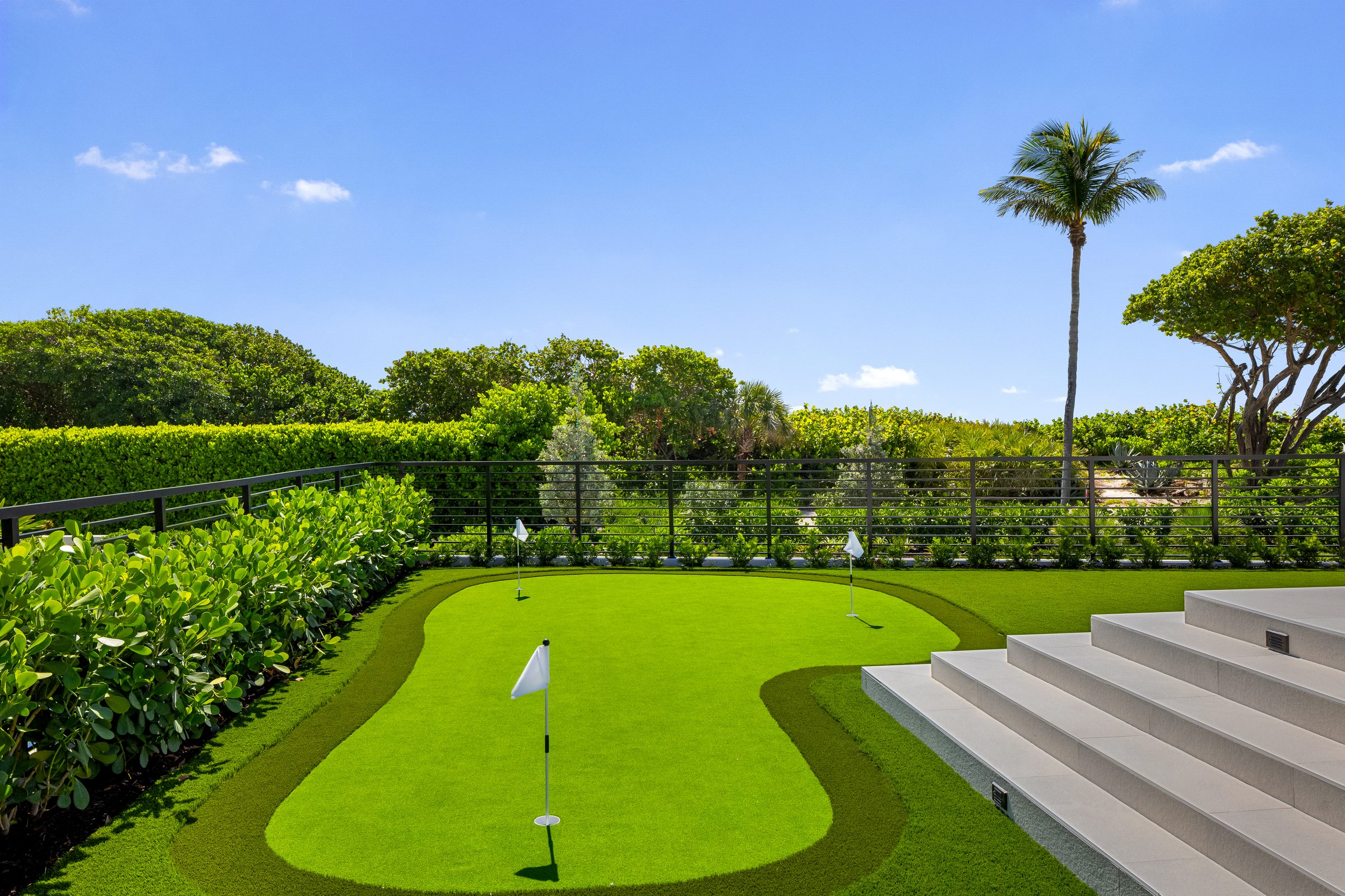 Private putting green in Ocean Ridge — built by Varga Homes