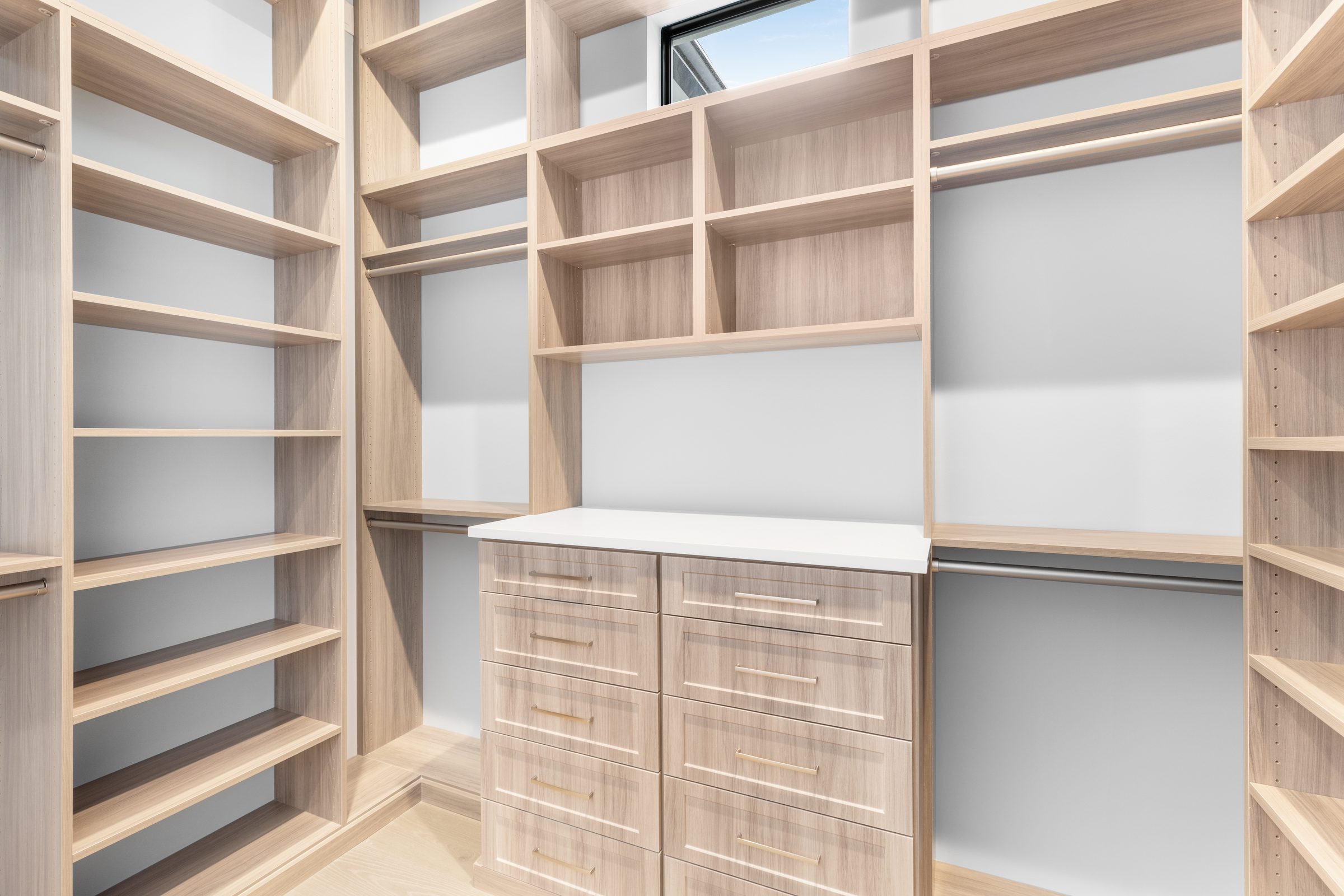 Primary walk-in closet in Delray Beach — built by Varga Homes