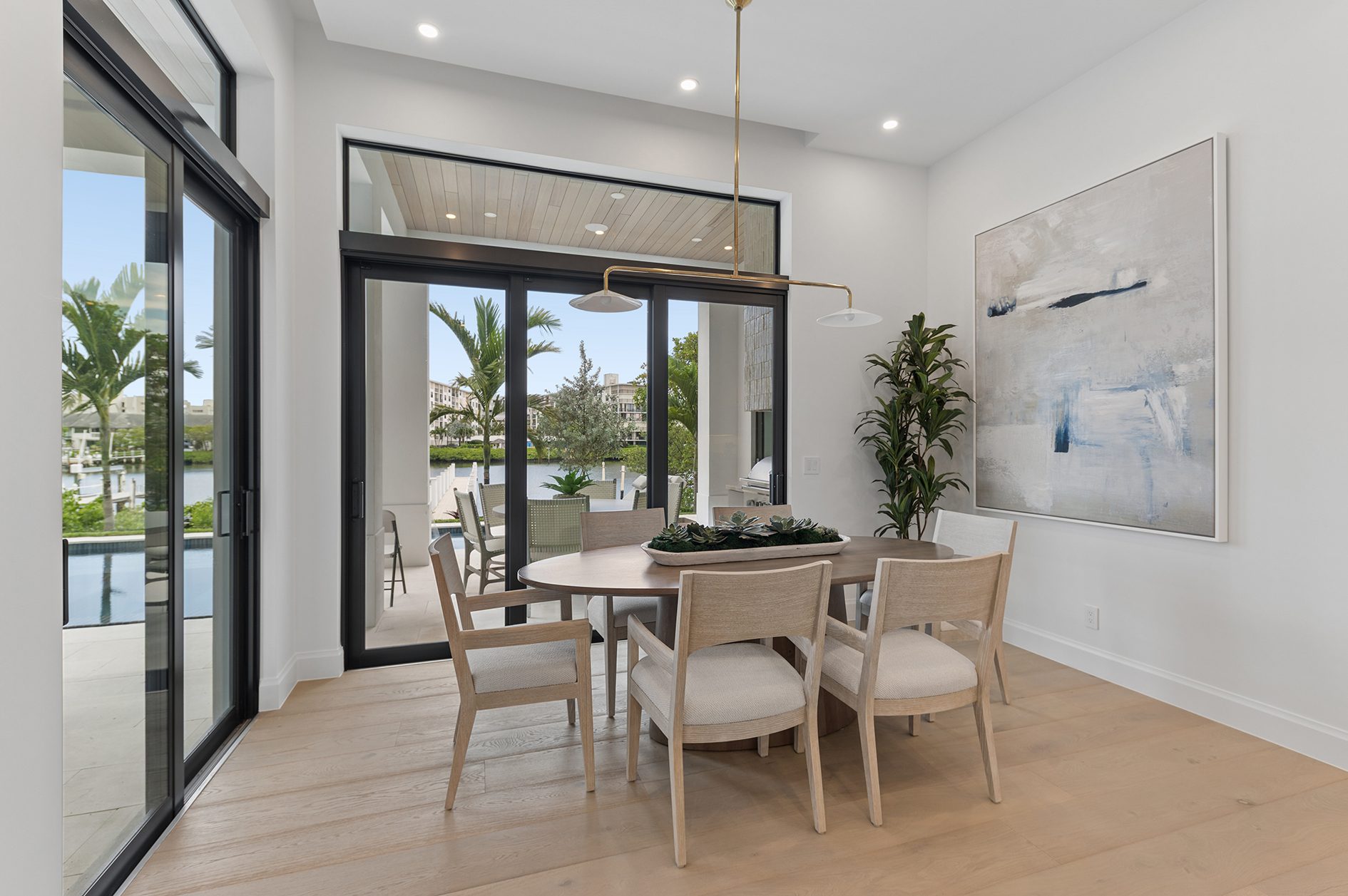 Breakfast room overlooking the water on Hypoluxo Island, Lantana — built by Varga Homes