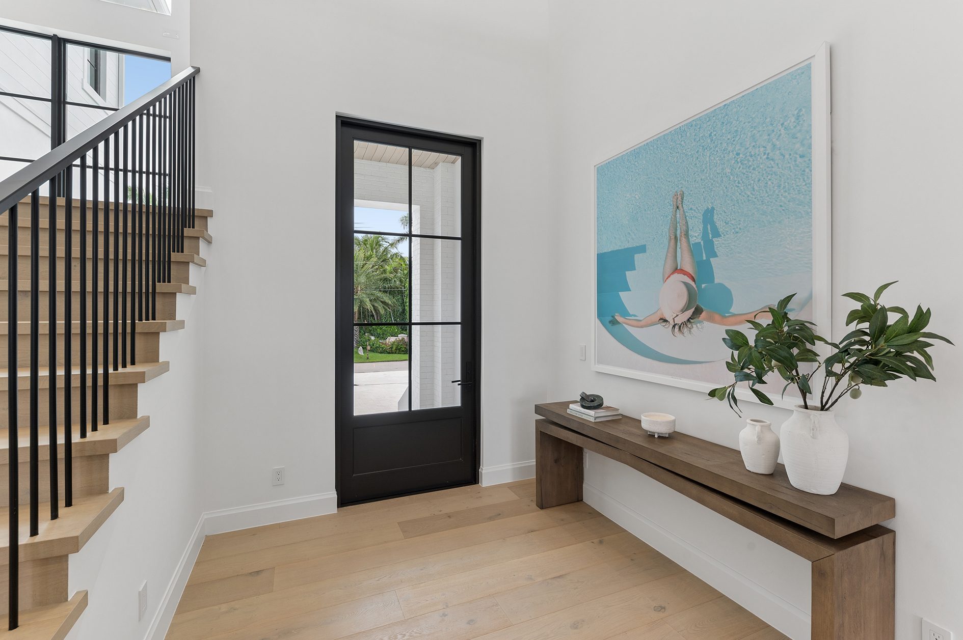 Entry foyer and stair on Hypoluxo Island, Lantana — built by Varga Homes