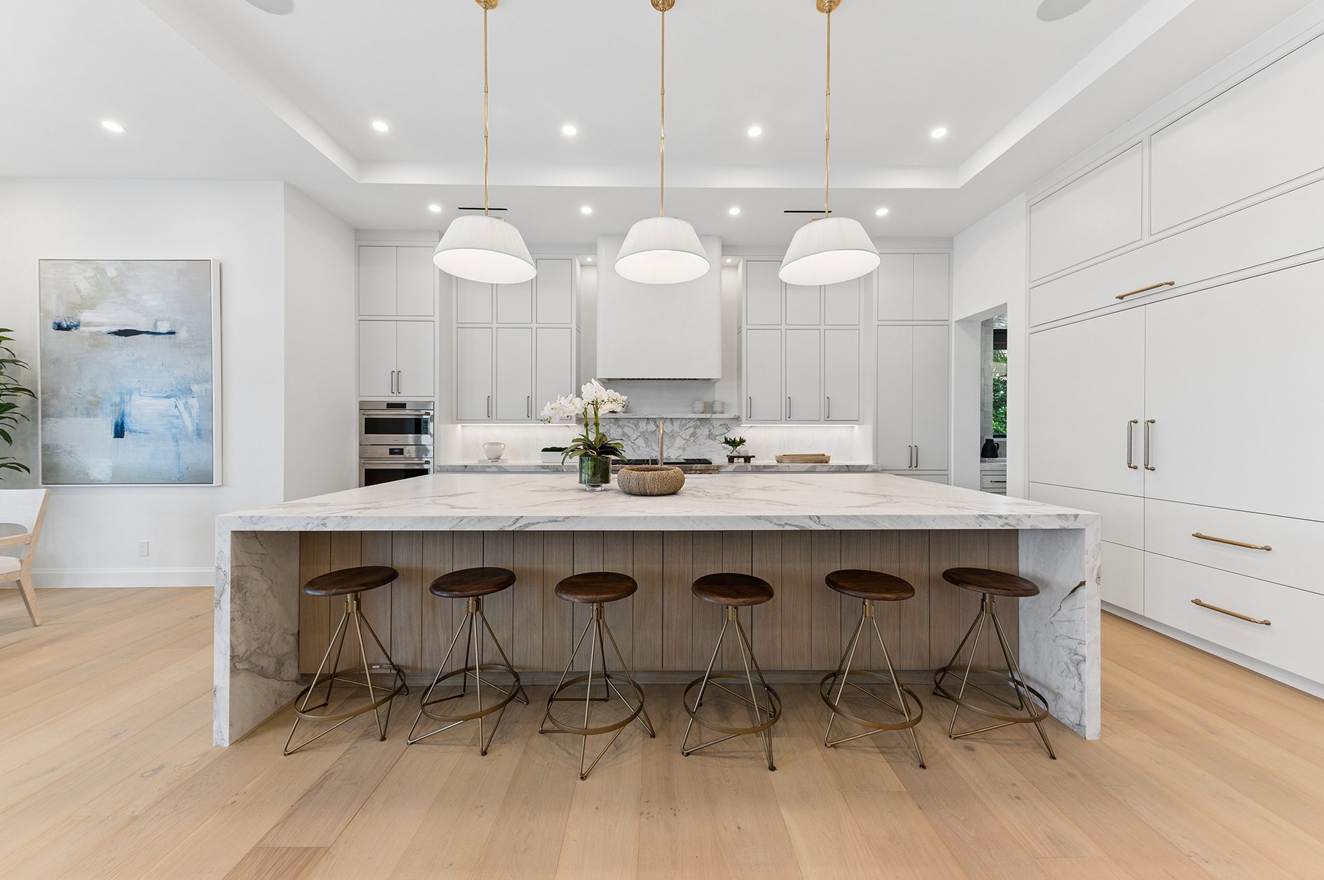 Kitchen island and seating on Hypoluxo Island, Lantana — built by Varga Homes