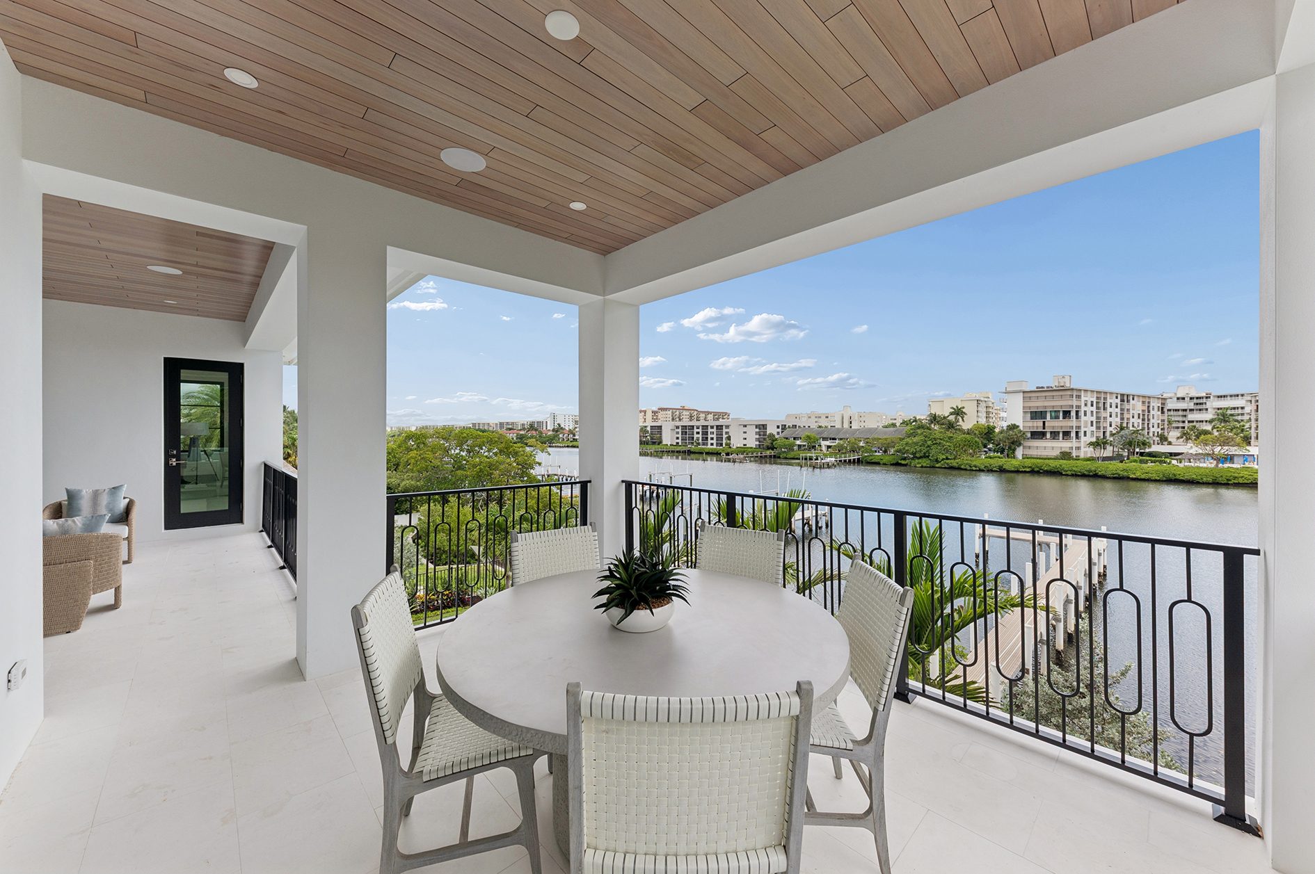 Upper terrace overlooking the water on Hypoluxo Island, Lantana — built by Varga Homes