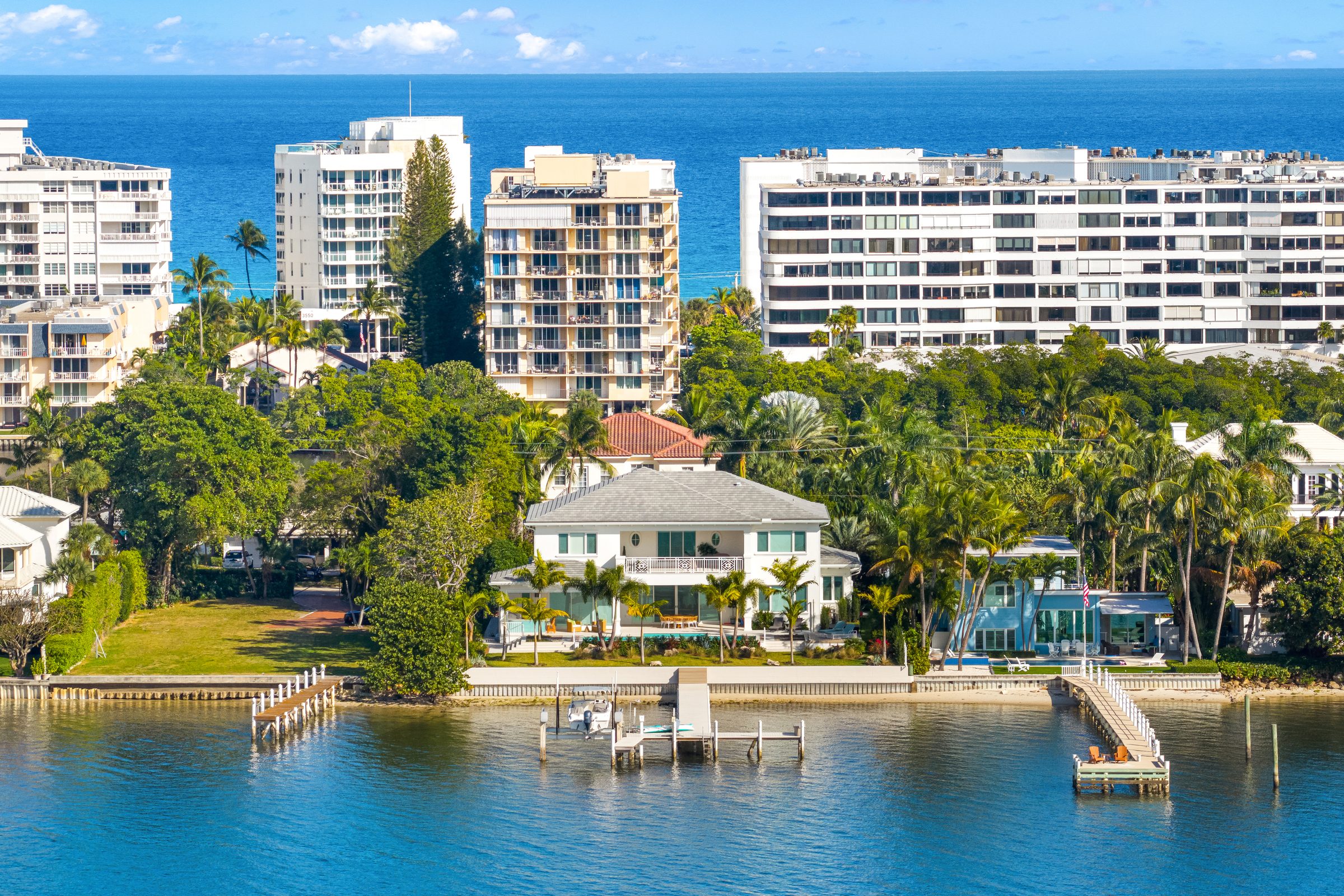 Aerial view of the waterfront custom home in Lantana — built by Varga Homes